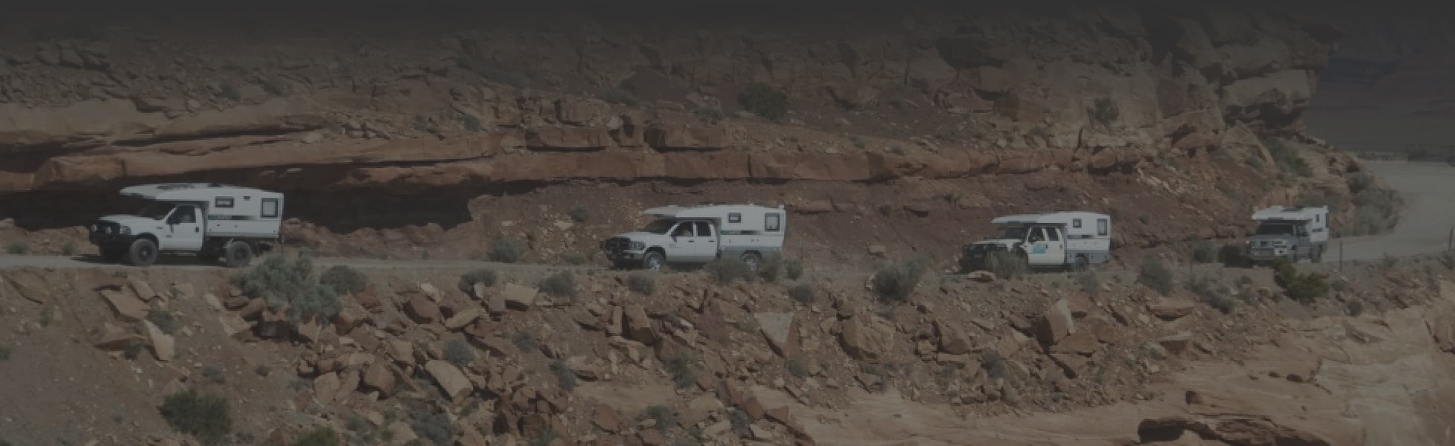 Truck driving across desert