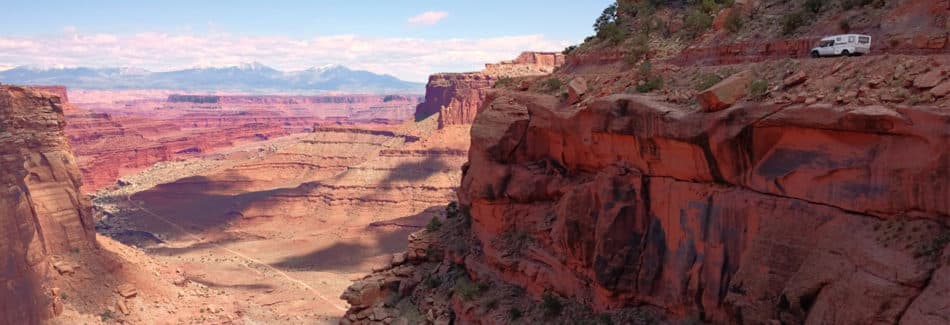 truck driving along canyon